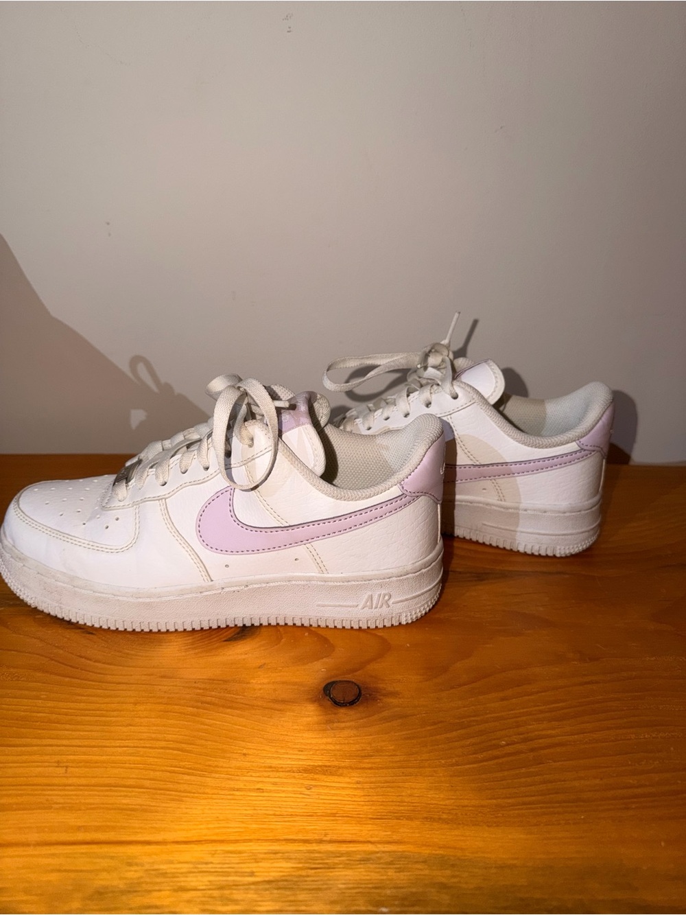 Nike Women's White Sneakers with Light Pink Swoosh